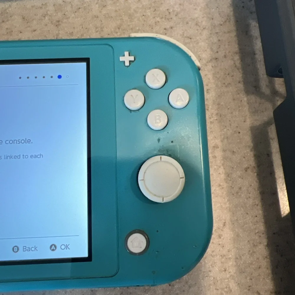 Nintendo Switch Lite Handheld Teal with Pikachu Case One Game And Console Case